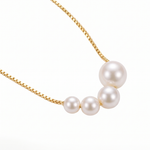 Elegant Gold Necklace with Freshwater Pearls — yellow gold, pendant close-up
