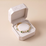 Elegant Daisy Bracelet with Green Crystals