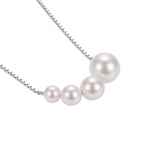 Elegant Gold Necklace with Freshwater Pearls — white gold, pendant close-up