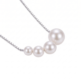 Elegant Gold Necklace with Freshwater Pearls — white gold, pendant close-up
