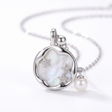 Moonstone with Pearl Necklace in Gold — silver, close-up
