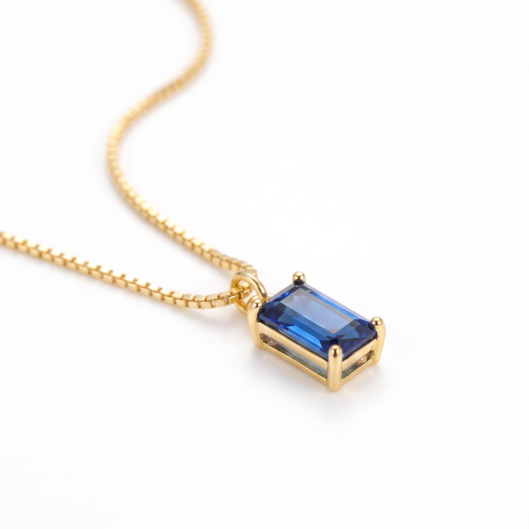 Minimalist Sapphire Pendant Necklace — Yellow gold, pendant close-up