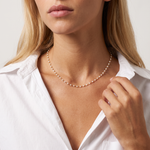 Model wearing the Clean White Bead Necklace